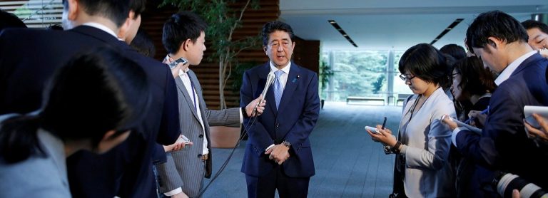 Japan top spokesman denies PM Abe's involvement in another school scandal