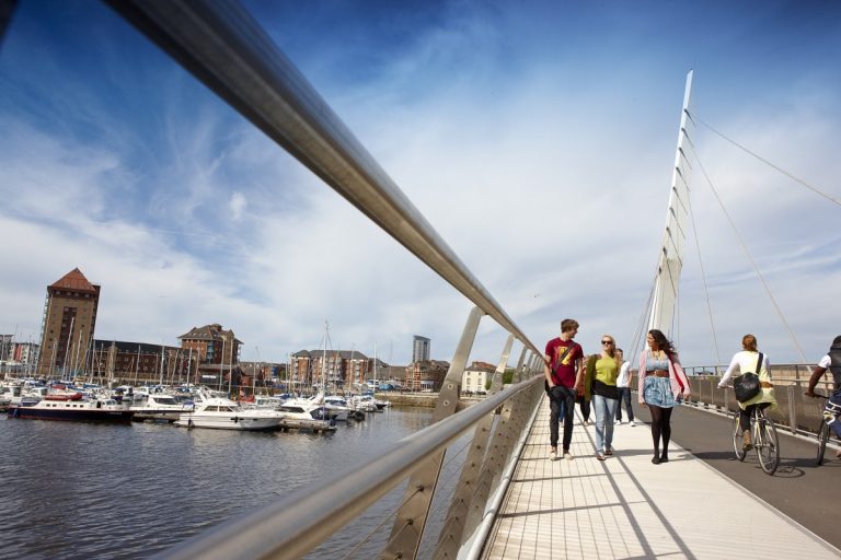 Students on Sail Bridge. Source: Swansea University