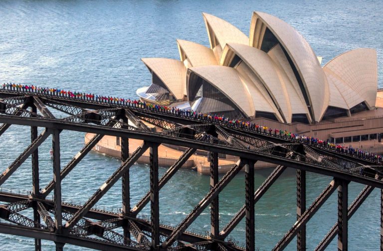360 students do record-breaking climb on Sydney Harbour Bridge
