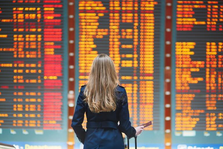 When's the best time for international students to buy flight tickets?