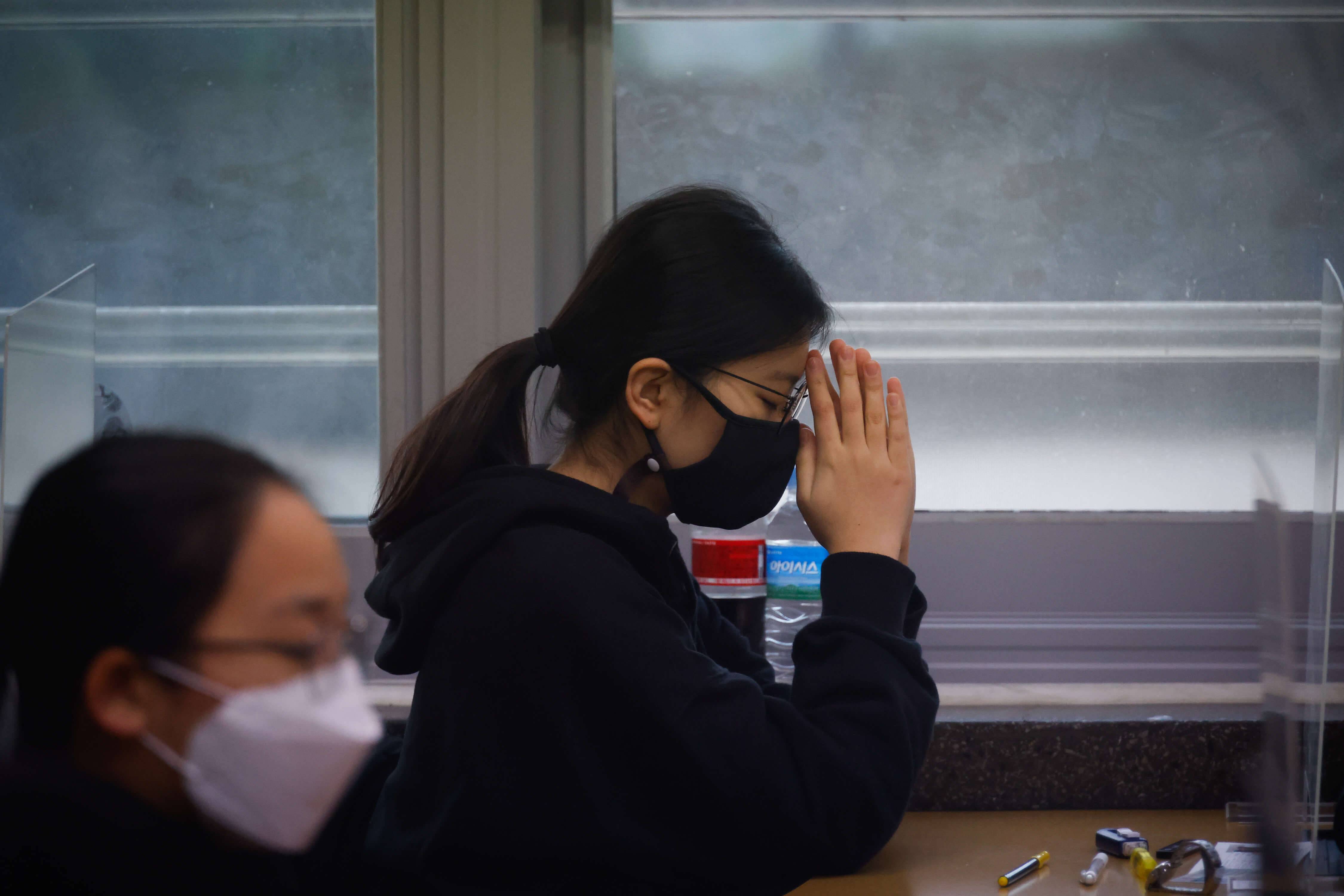 Testing time: South Korean students take exam with virus precautions