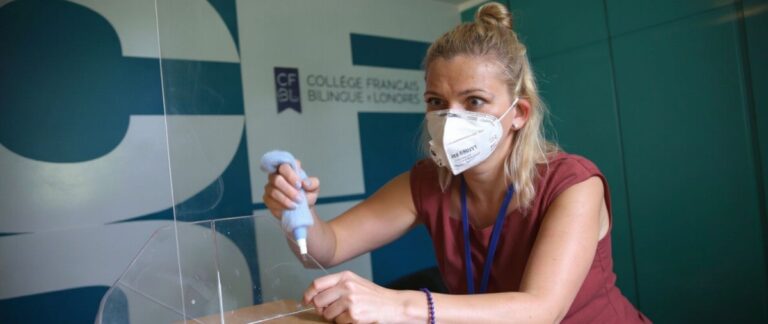 Debates rage in Britain as some children go back to school