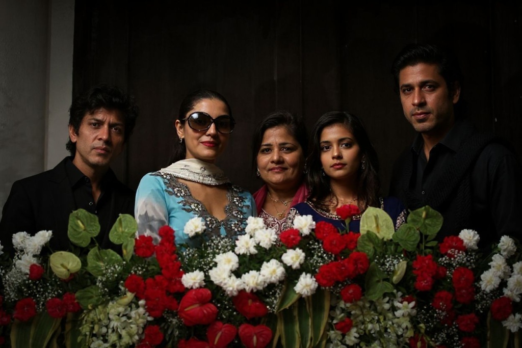 Indian Bollywood actor Shah Rukh Khan (R), pictured with his family (L-2nd R); son Aryan Khan, wife Gauri Khan, sister Shehnaz, and daughter Suhana, pose during an event at his residence during the Muslim festival of Eid al-Fitr in Mumbai. Source: STRDEL/