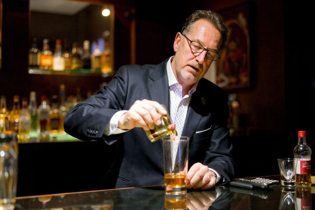 Bar owner Salvatore Calabrese, mixes a glass of “Salvatore’s Legacy”, during an attempt to make the world’s most expensive cocktail at “Salvatore’s Playboy Club” in London, England. Source: Leon Neal/