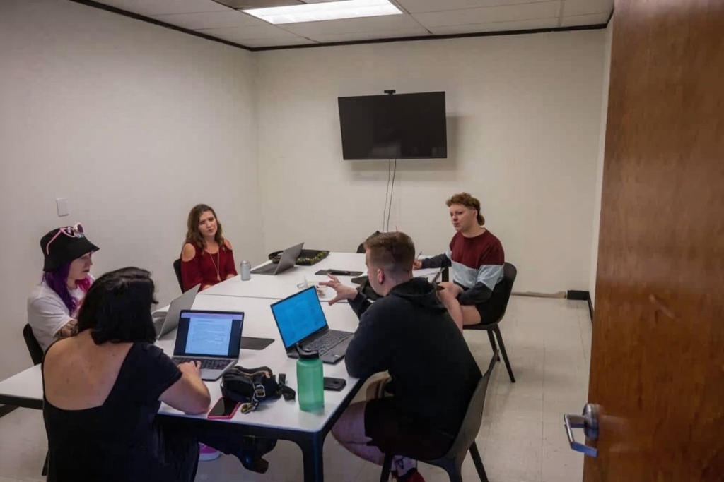 Working with peers i s a great way to overcome difficult math problems together. Source: