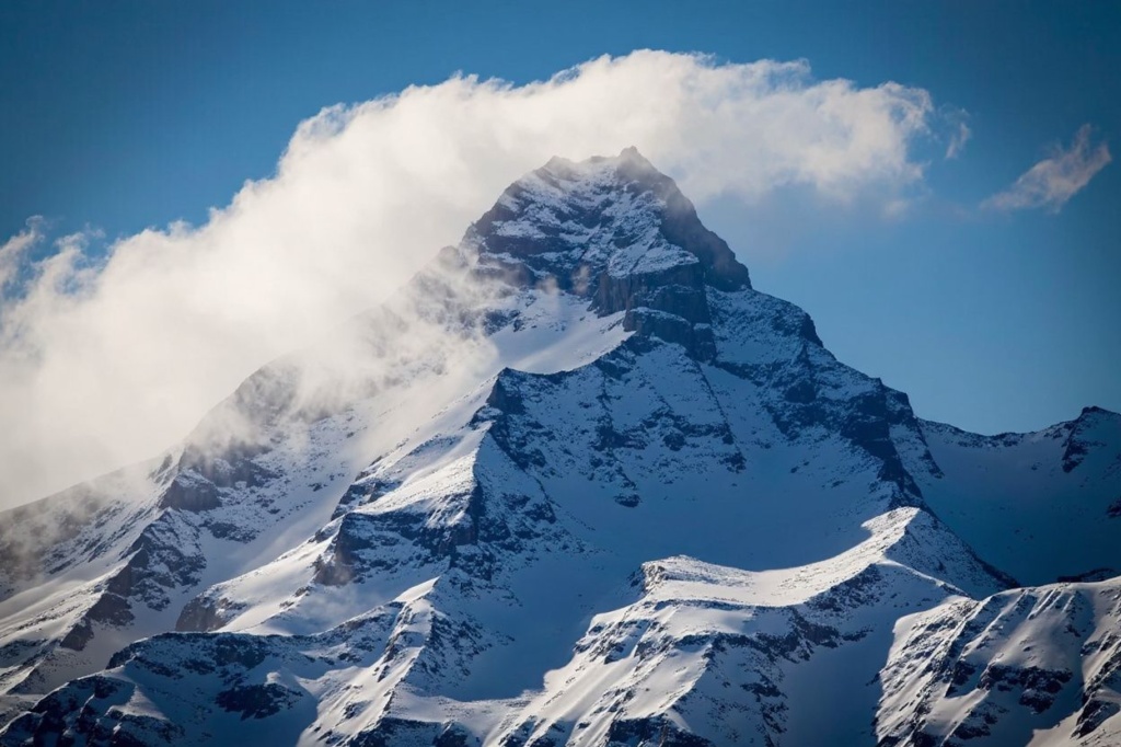 The 4506 meters high Weisshorn mountain is surrounded by gusts of wind in the Swiss Alps prior to the start of the FIS Alpine Ski World Cup in Crans-Montana, Switzerland, on February 26, 2022. (Photo by Fabrice COFFRINI / )