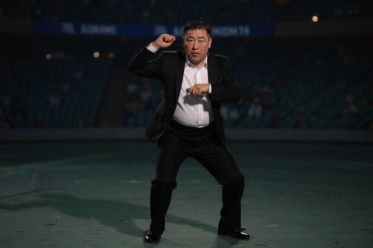 South Korean pop star Psy (C) performs during the opening ceremony of the 2014 Asian Games at the Incheon Asiad Main Stadium in Incheon on September 19, 2014.      PHOTO / ED JONES (Photo by ED JONES / )