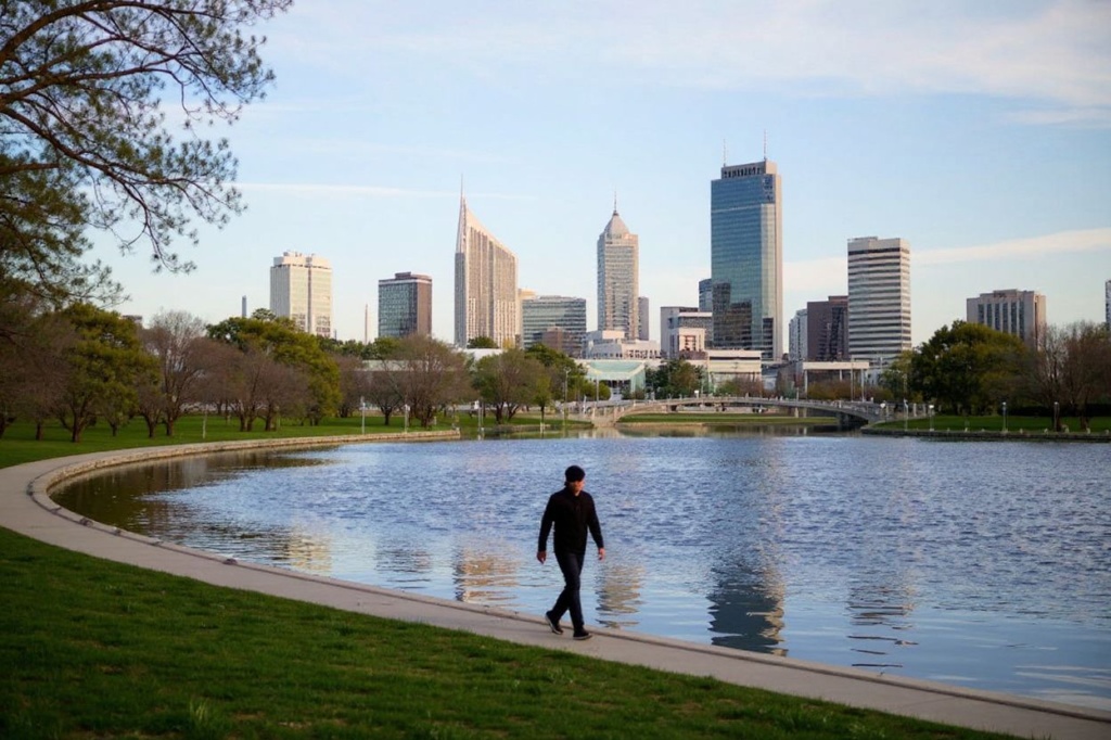 A resident walks by the usually busy Lake Burley Griffin in Canberra on August 12, 2021, as Australia’s capital was ordered into a seven-day lockdown after a single Covid-19 case was detected. (Photo by Rohan THOMSON / )