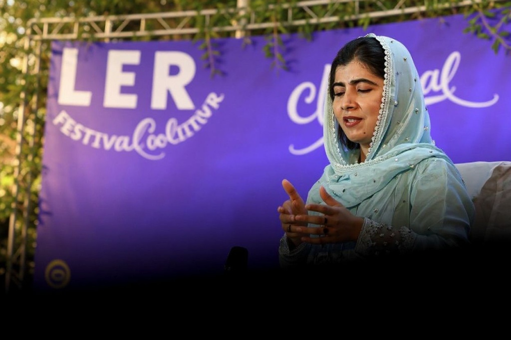 Malala Yousafzai gestures during the opening ceremony of LER, Festival do Leitor (Reader’s Festival), at the Maracanazinho gymnasium in Rio de Janeiro, Brazil, on May 22, 2023. (Photo by MAURO PIMENTEL / )