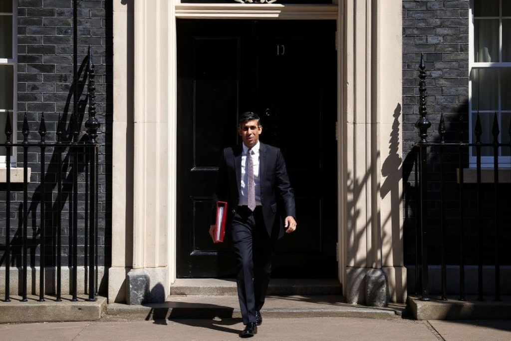 Britain’s Prime Minister Rishi Sunak leaves 10 Downing Street in central London on June 14, 2023 on his way to take part in the weekly session of Prime Minister’s Questions (PMQs) in the House of Commons. (Photo by HENRY NICHOLLS / )