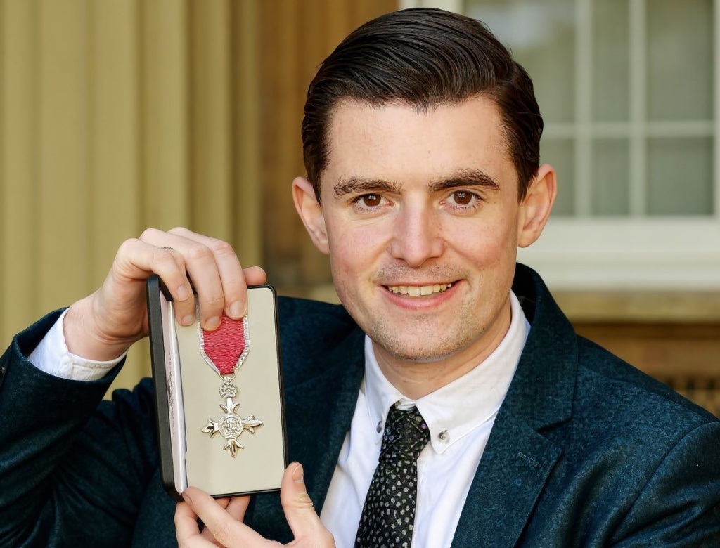 SuperJam founder Fraser Doherty holds his Member of the Order of the British Empire (MBE) medal. Source: John Stillwell/Pool/