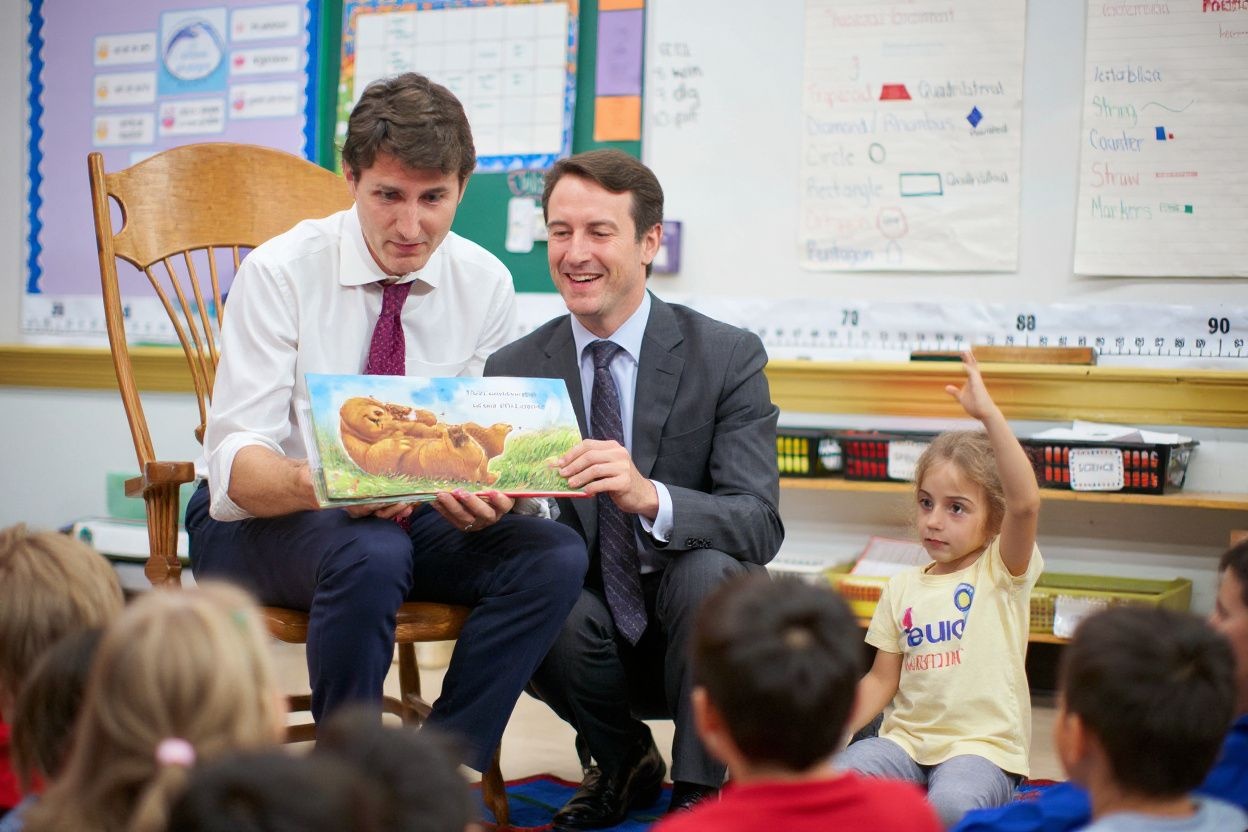 Canadian Prime Minister Justin Trudeau reads a story to Grade 1 and 2 students at a campaign stop at Blessed Sacrament Catholic Elementary School in London, Ontario on September 16, 2019. – Polls showed Trudeau, once the youthful golden boy of Canadian politics, in a horse race with Conservative Andrew Scheer, who launched his bid for leadership by accusing the Liberal prime minister of lying “to cover up scandals.” (Photo by Geoff Robins / )