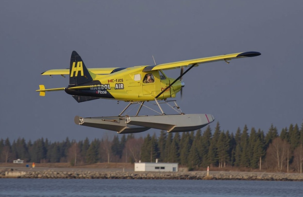 Harbour Air Pilot and CEO Greg McDougall flies the worlds first all-electric, zero-emission commercial aircraft during a test flight in a de Havilland DHC-2 Beaver from Vancouver International Airports South Terminal on the Fraser River in Richmond, British Columbia, Canada, December 10, 2019. The plane, which first flew in 1947, became the worlds first commercial test of an all-electric airplane. It is now powered by the magni500, a 750 horsepower (HP) all-electric motor, built by magniX. (Photo by Don MacKinnon / )