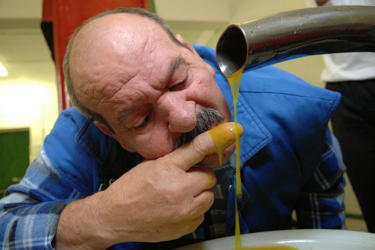 Not only spilling olive oil will bring you bad luck, it will be hard for you to clean it up. Source: