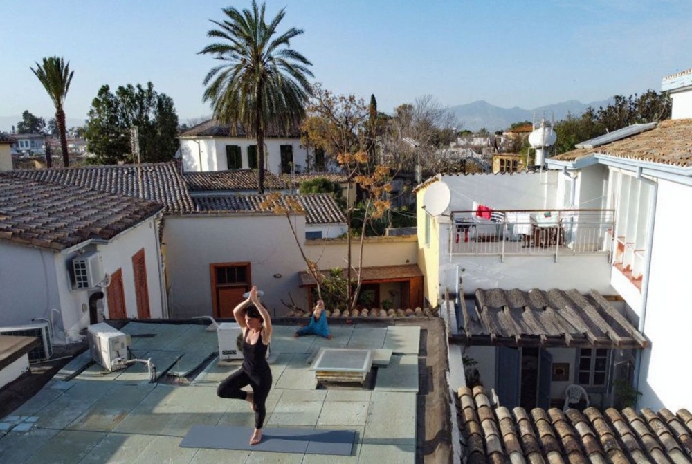 Yoga and breathing exercises can help us become more mindful, thus easing stress. Source: Amir Makar/