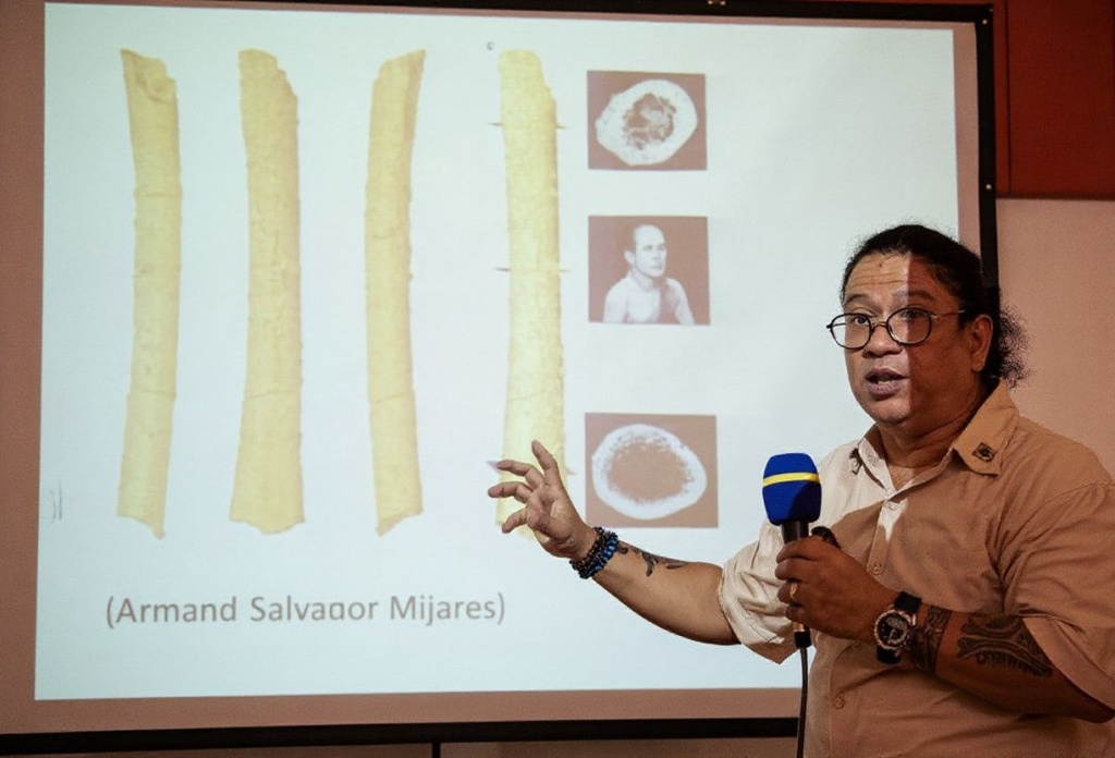 University of the Philippines (UP) Associate Professor Armand Salvador Mijares points to a projection of bones of a discovered new human species, the Homo luzonensis, at a press conference at the UP College of Science Auditorium in Manila on April 11, 2019. The human family tree has acquired a new branch with the unearthing of a previously unknown species of human that lived on an island in today’s Philippines some 50,000 years ago. The species, dubbed Homo luzonensis after the island of Luzon where its remains were found, is not a direct ancestor of modern day humans, but rather a distant ancient relative. (Photo by Noel CELIS / ) / The erroneous mention[s] appearing in the metadata of this photo by Noel CELIS has been modified in  systems in the following manner: [Armand Salvador Mijares] instead of [Armand Salvador]. Please immediately remove the erroneous mention[s] from all your online services and delete it (them) from your servers. If you have been authorized by  to distribute it (them) to third parties, please ensure that the same actions are carried out by them. Failure to promptly comply with these instructions will entail liability on your part for any continued or post notification usage. Therefore we thank you very much for all your attention and prompt action. We are sorry for the inconvenience this notification may cause and remain at your disposal for any further information you may require.