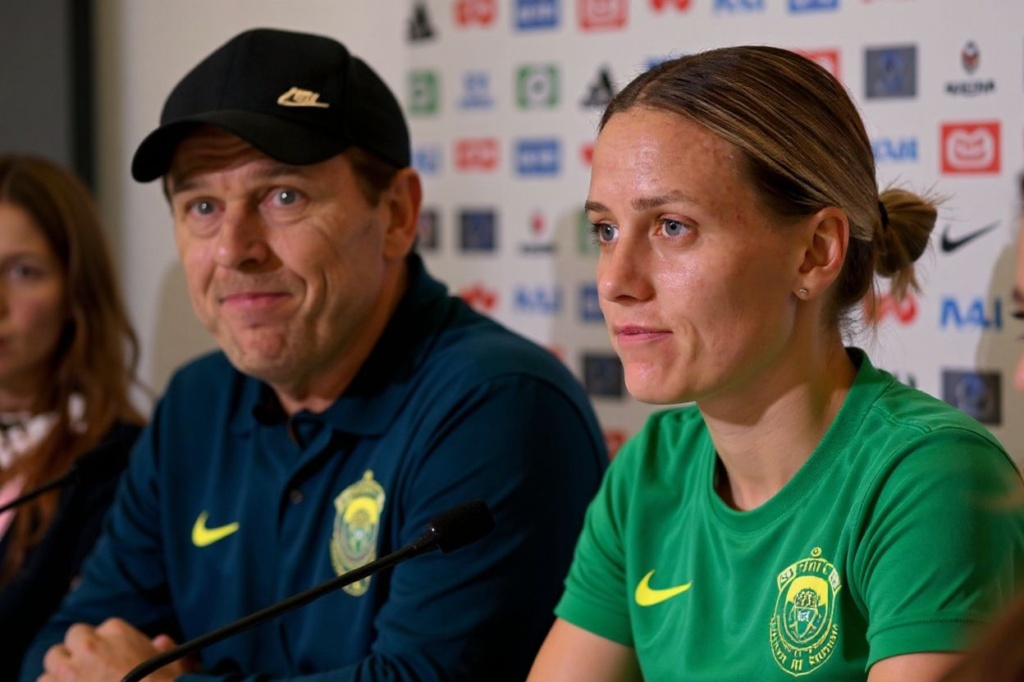 Australia’s coach Tony Gustavsson (L) and player Emily van Egmond (R) attend a press conference in Melbourne on July 30, 2023, on the eve of the Women’s World Cup football match between Canada and Australia. (Photo by William WEST / )