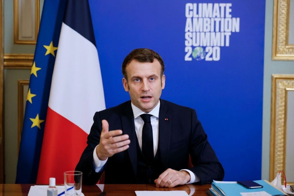 French President Emmanuel Macron gestures as he speaks during the Climate Ambition Summit 2020 video conference meeting. Source: Yoan Valat/