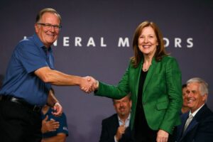 Mary Barra, a female MBA as well as the chairman and CEO of General Motors, and United Auto Workers President Gary Jones open the 2019 GM-UAW contract talks with the traditional ceremonial handshake on July 16, 2019 in Detroit, Michigan. Source: Bill Pugliano / GETTY IMAGES NORTH AMERICA / Getty Images via
