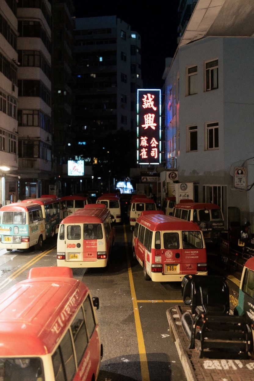 Minibuses are pictured along a road in Hong Kong’s Mong Kok area — this country is the perfect blend of the old and the new. Source: Bertha Wang/