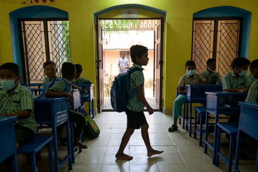 Students attend their class as schools reopened after summer vaccination in Chennai on June 13, 2022. (Photo by Arun SANKAR / )