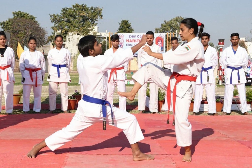Students demonstrate their karate skills during the 65th annual sports and athletics meet at DAV College ground in Amritsar February 16, 2020. (Photo by NARINDER NANU / )