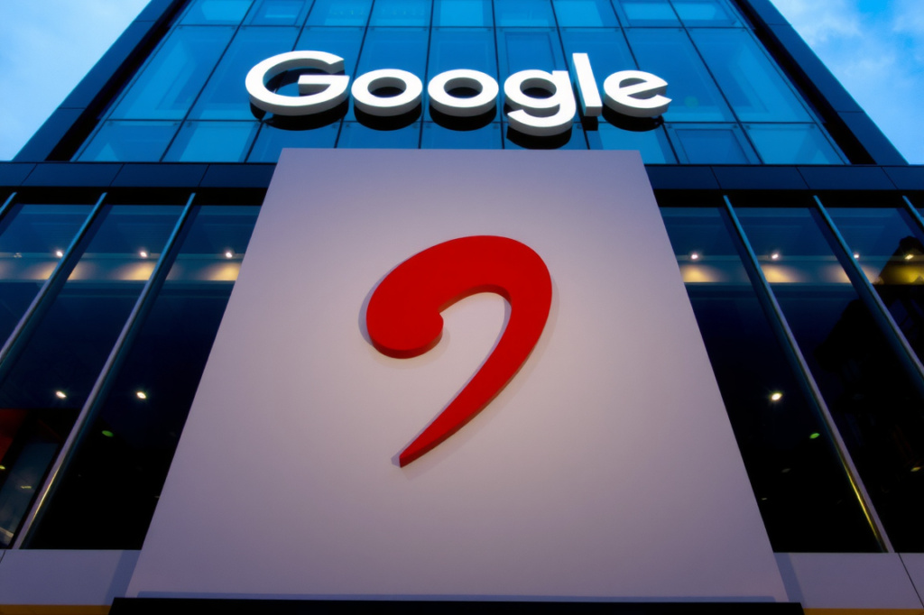 The Google logo is pictured at the Google India office building in Hyderabad on January 28, 2022. – Google will invest up to  billion in India’s second-largest mobile operator, Airtel, the companies said on January 28, as the Android-maker looks to bolster its presence in the vast nation’s booming telecoms market. (Photo by Noah SEELAM / ), shot on Nikon D850, 35mm f/1.8 lens, RAW photograph, unedited, candid moment, natural lighting, photojournalistic style | NEGATIVE: AI generated, artificial, computer generated, digital art, 3d render