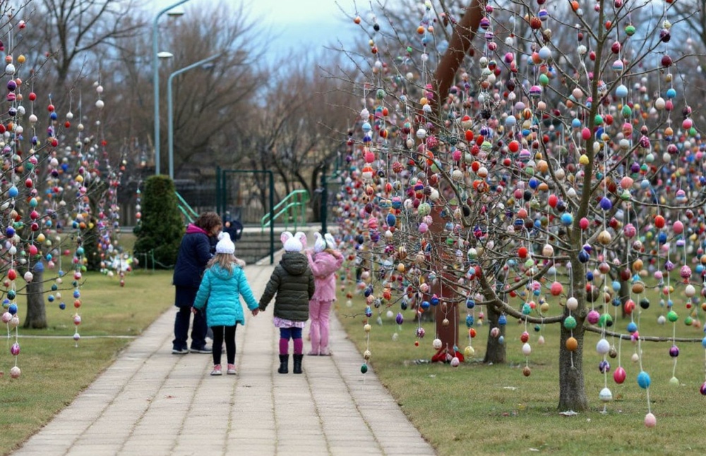 Fruit trees are decorated with thousands of Easter eggs on Good Friday, April 2, 2021 at the eduva nursery-kindergarten in Seduva, Lithuania. Source: Petras Malukas/