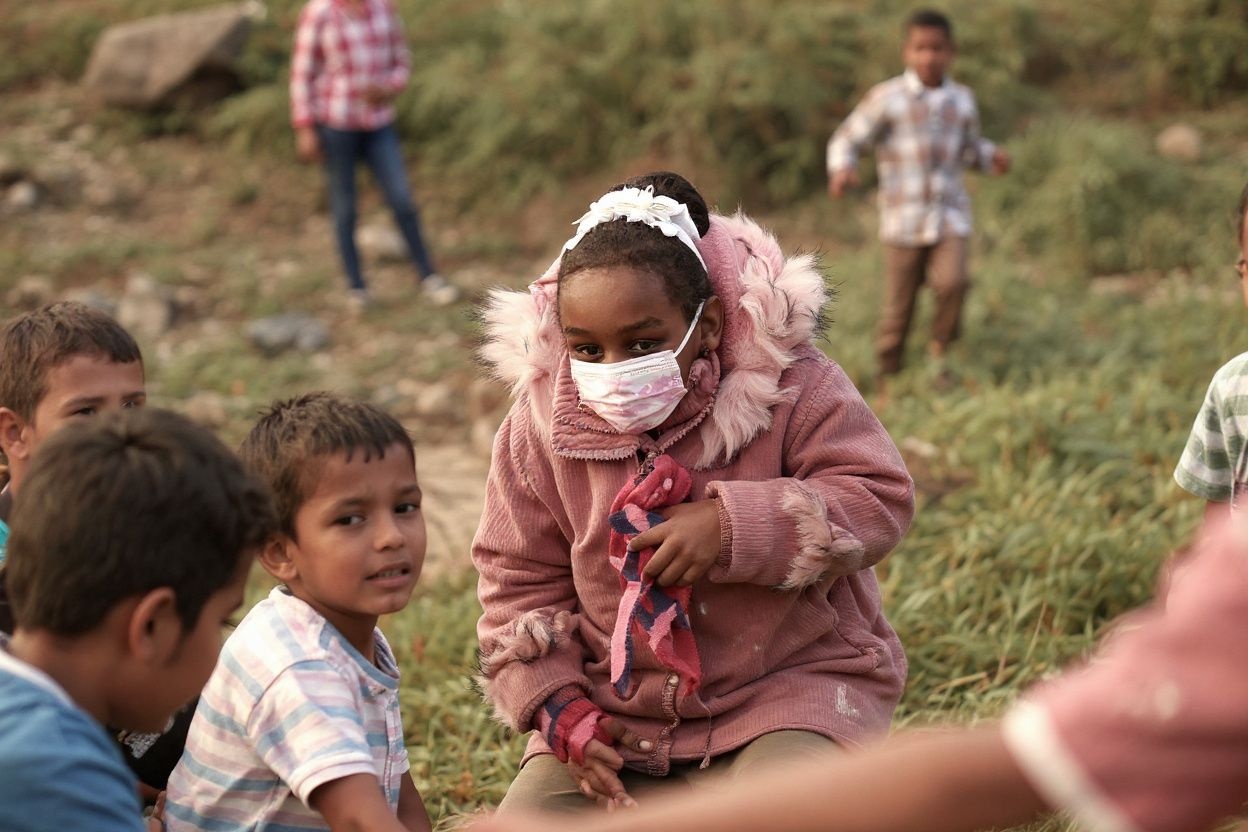 Facing challenges outdoors as a group can help children gain confidence and form stronger bonds with their peers. Source: Mohammed Abed/