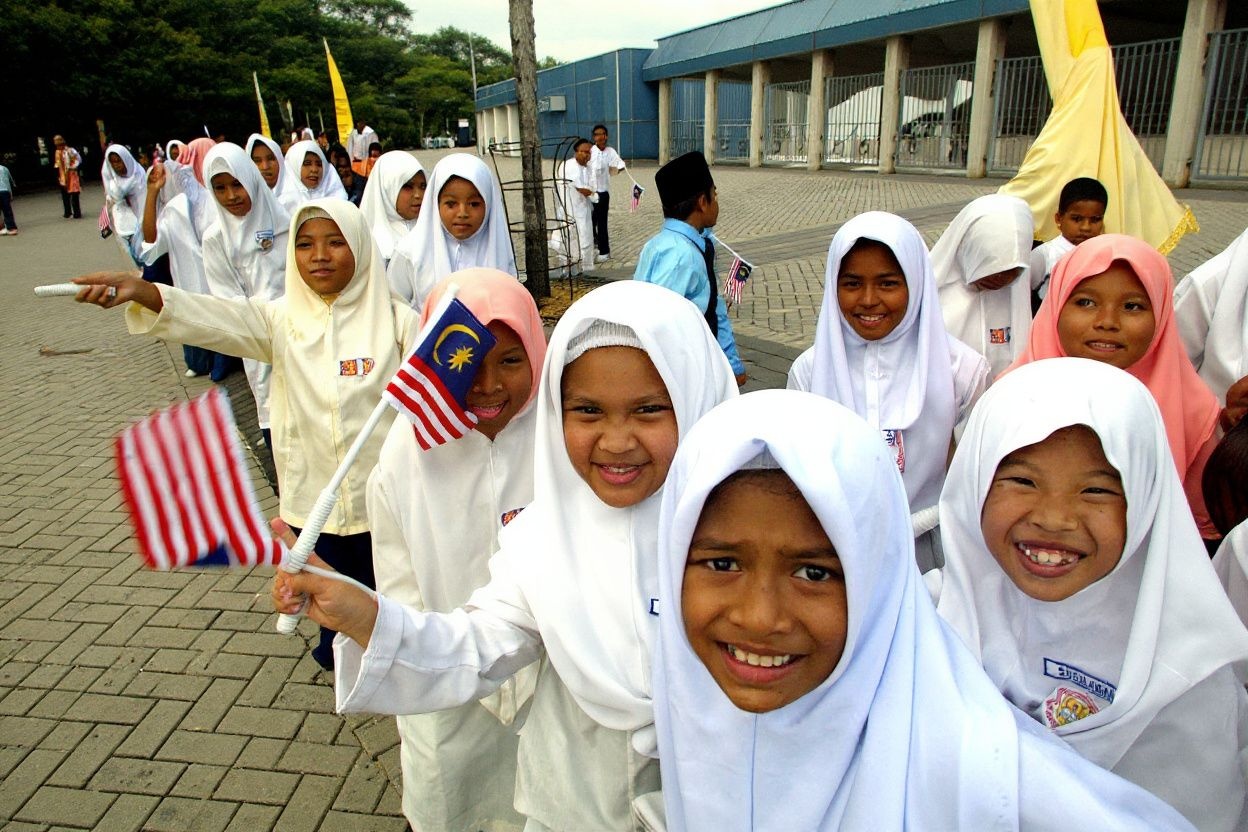 Malaysia and Malta are two countries that enforces students to wear uniforms. Sources: