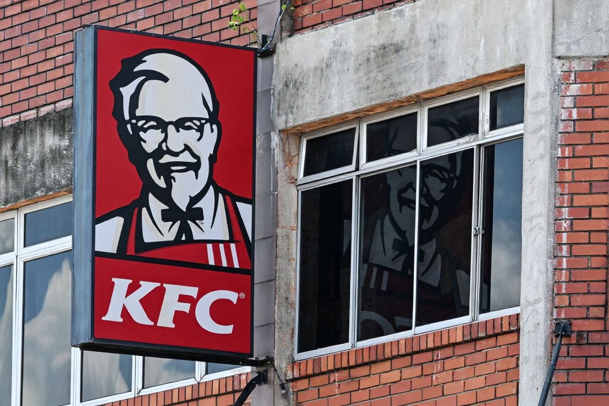 Most kids know about KFC, but do they know how to pronounce Colonel Sanders properly?, shot on Nikon D850, 35mm f/1.8 lens, RAW photograph, unedited, candid moment, natural lighting, photojournalistic style | NEGATIVE: AI generated, artificial, computer generated, digital art, 3d render