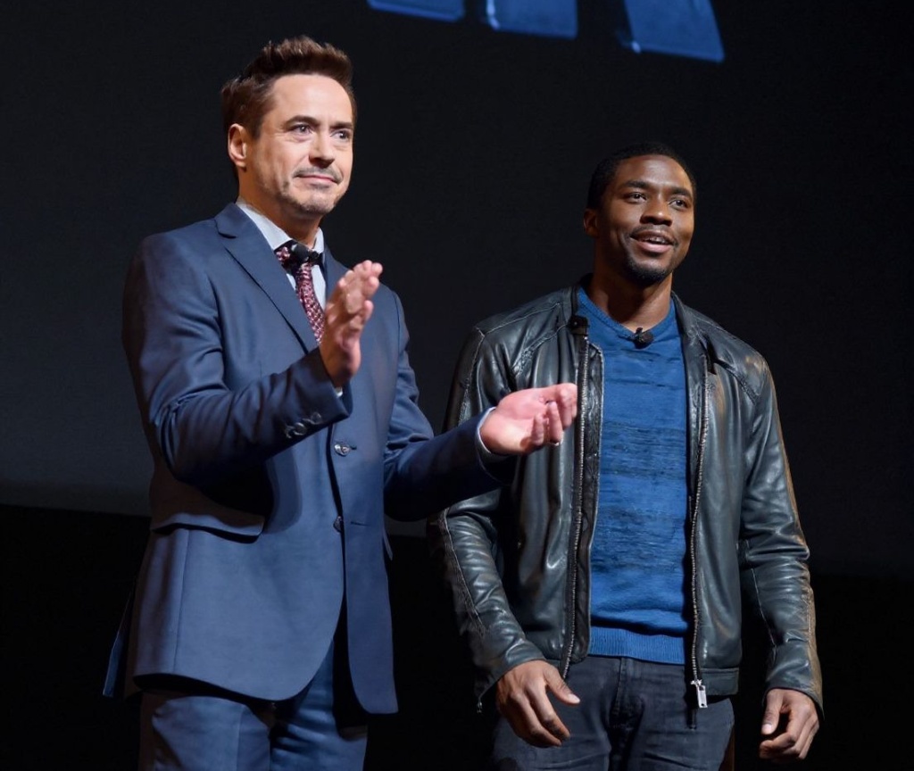 LOS ANGELES, CA – OCTOBER 28: Actors Robert Downey Jr. (L) and Chadwick Boseman onstage during Marvel Studios fan event at The El Capitan Theatre on October 28, 2014 in Los Angeles, California.   Alberto E. Rodriguez/Getty Images for Disney/ (Photo by Alberto E. Rodriguez / GETTY IMAGES NORTH AMERICA / Getty Images via )