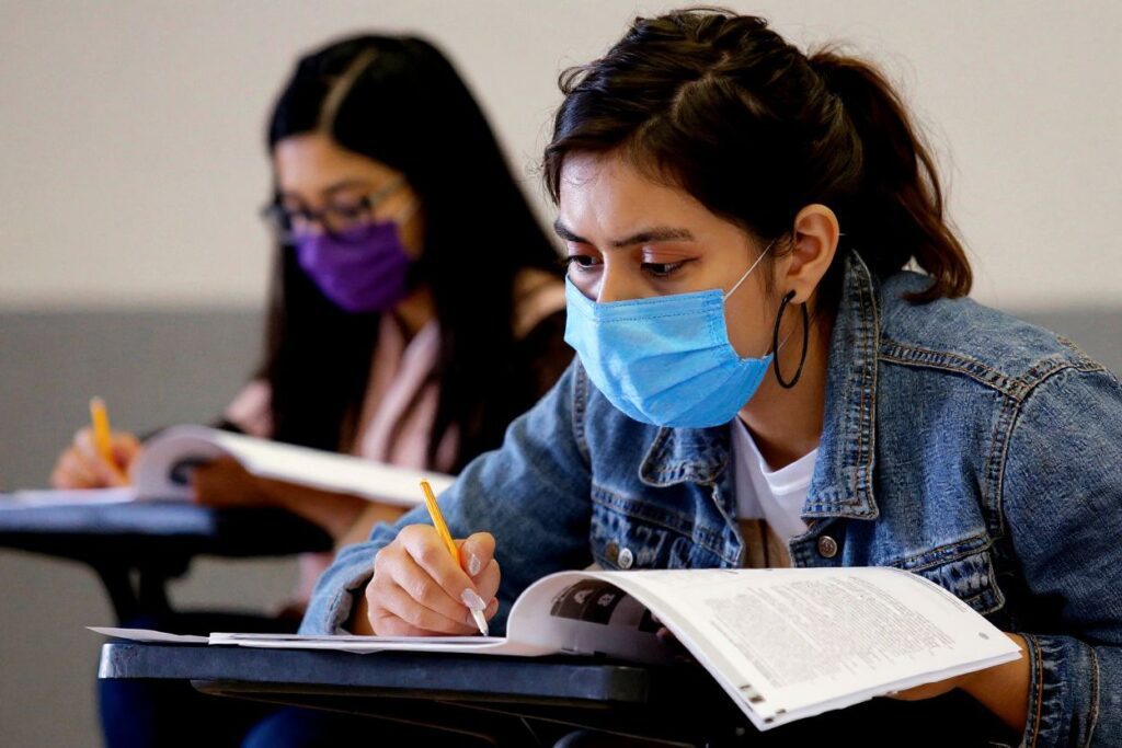 Students take the admission exam for a place in the different face-to-face careers of Law, Criminology, and International Relations, at the University Center for Social Sciences and Humanities of the University of Guadalajara. Source: Ulises Ruiz /
