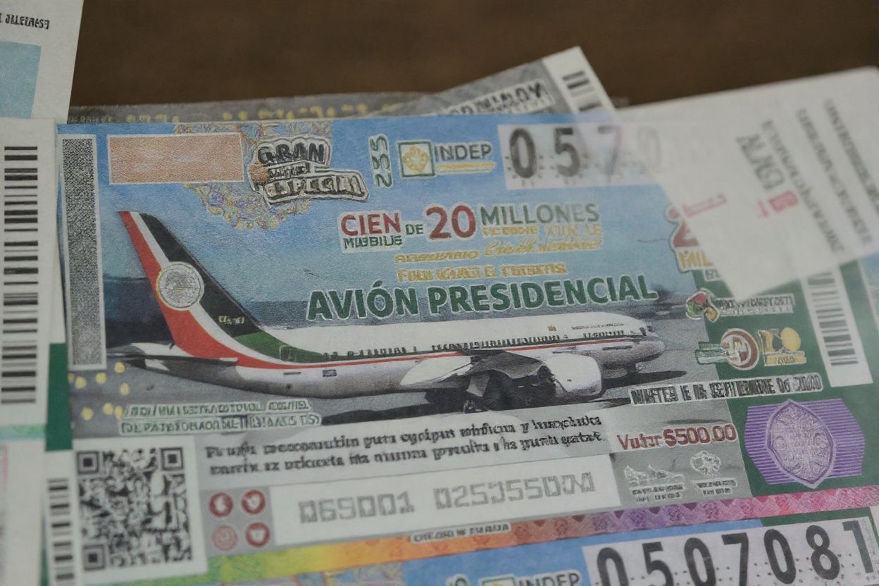 View of lottery tickets depicting the luxurious presidential plane in Mexico City, on March 10, 2020. – The government of Mexico City started to sell lottery tickets to participate in the president’s plane raffle next September 15, 2020. (Photo by Pedro PARDO / )
