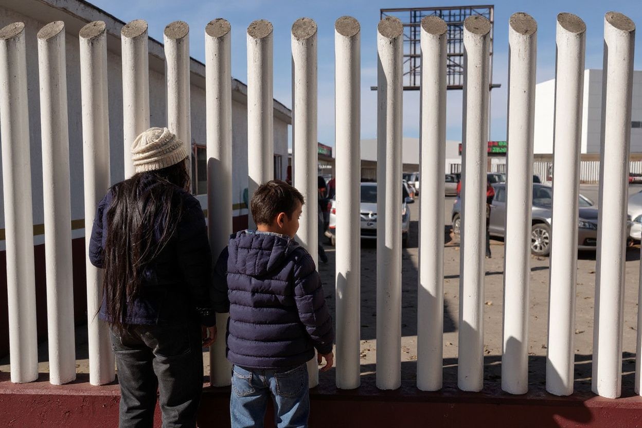 Children and their families are left stranded on the borders., shot on Sony A7R IV, 85mm f/1.4 lens, RAW photograph, unedited, candid moment, natural lighting, photojournalistic style | NEGATIVE: AI generated, artificial, computer generated, digital art, 3d render