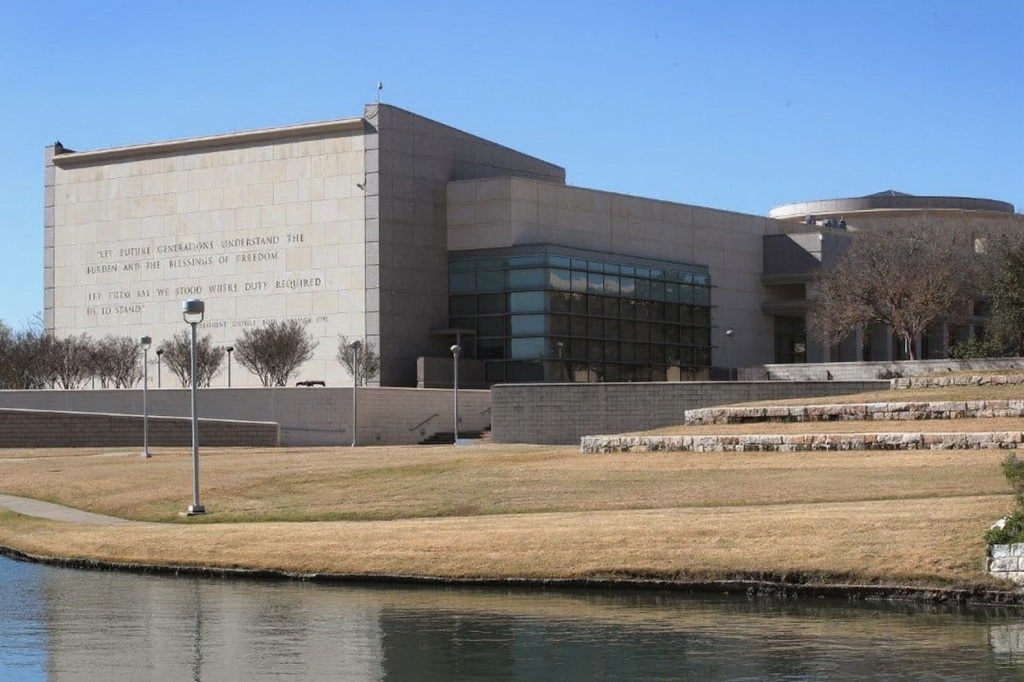 COLLEGE STATION, TX – DECEMBER 02: Visitors walk along a pond behind the George H.W. Bush Presidential Library Center on the campus of Texas A&M University on December 2, 2018 in College Station, Texas. Bush, who died on November 30, will be buried next to his wife Barbara near the library on Thursday.   Scott Olson/Getty Images/ (Photo by SCOTT OLSON / GETTY IMAGES NORTH AMERICA / Getty Images via )