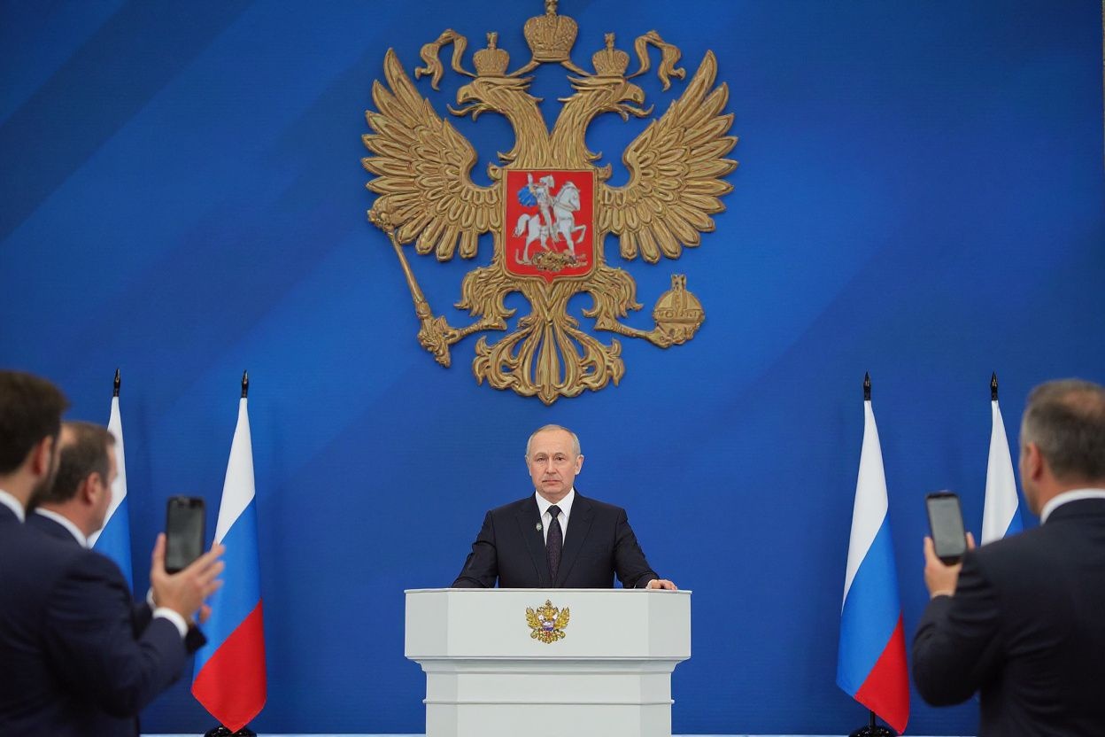 Russian President Vladimir Putin delivers his annual state of the nation address at the Federal Assembly at the Manezh Exhibition Hall in Moscow on April 21, 2021. – Russian President Vladimir Putin has kicked off his annual state of the nation address which sets the political agenda for the year, as supporters of jailed Kremlin critic Alexei Navalny prepared for mass protests. (Photo by Mikhail Klimentyev / Sputnik / )
