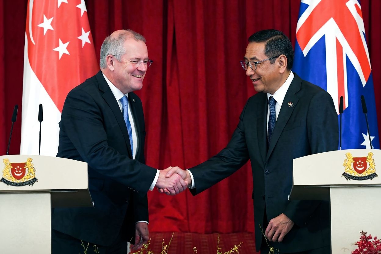 Australias Prime Minister Scott Morrison (L) and Singaporean counterpart Lee Hsien Loong shake hands during a joint press conference at the Istana Presidential Palace in Singapore on June 7, 2019. Source: Roslan Rahman/