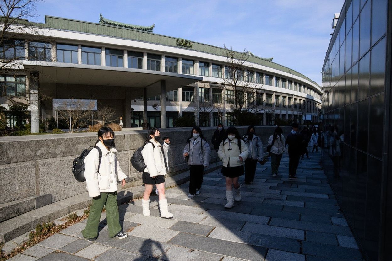 Ewha Womans University was founded in 1886, and it’s the first modern school for women in the country., shot on Canon EOS R5, 24-70mm f/2.8 lens, RAW photograph, unedited, candid moment, natural lighting, photojournalistic style | NEGATIVE: AI generated, artificial, computer generated, digital art, 3d render