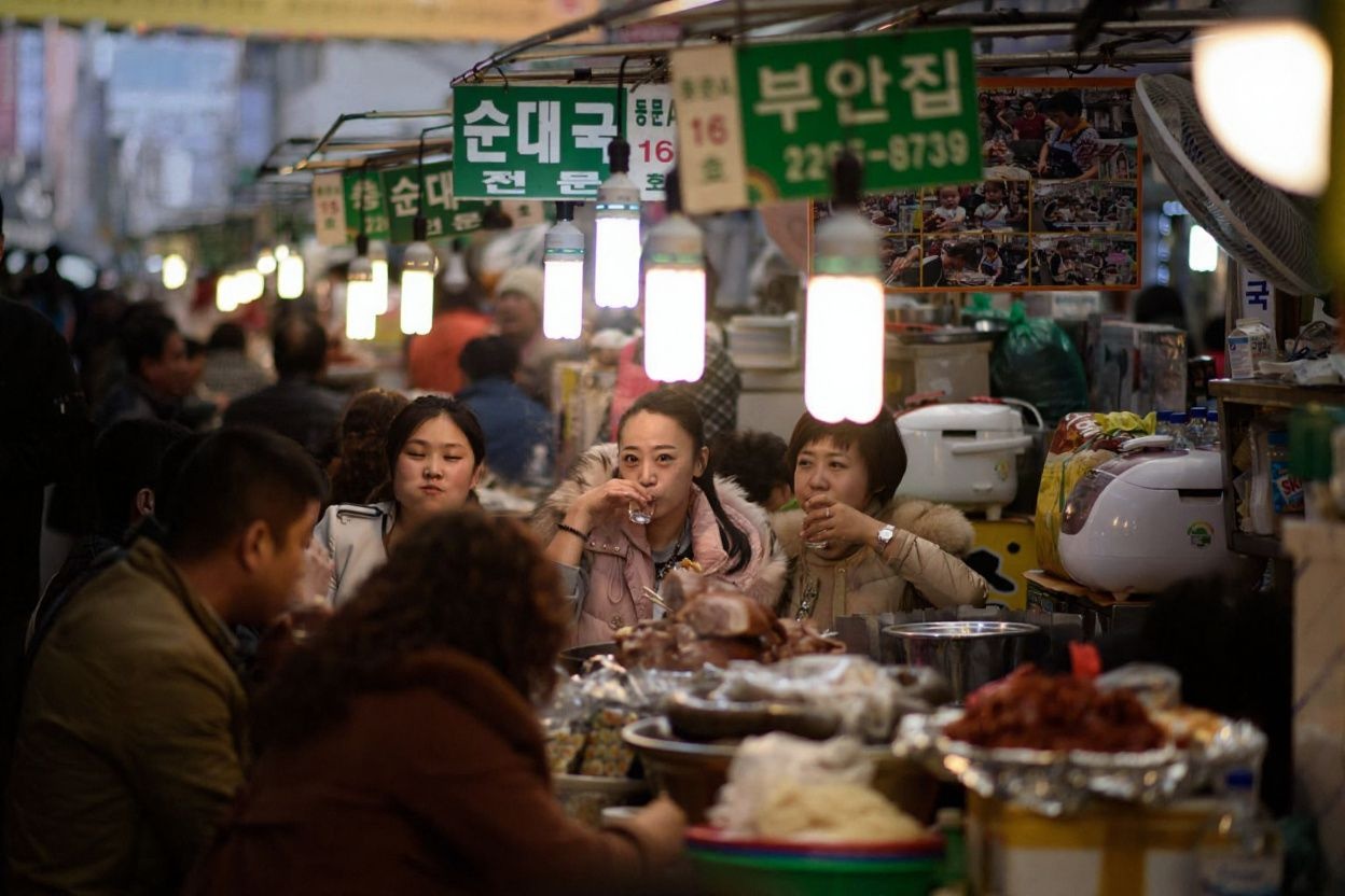 If you’ve watched a Korean drama or two, chances are that you’ve seen characters repeatedly down variations of soju., shot on Canon EOS R5, 24-70mm f/2.8 lens, RAW photograph, unedited, candid moment, natural lighting, photojournalistic style | NEGATIVE: AI generated, artificial, computer generated, digital art, 3d render