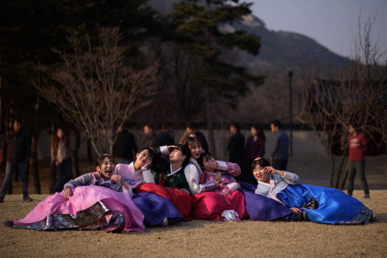 There has been an increase in international students moving to South Korea to pursue higher education in the past 13 years. Along with the increase, the South Korean government unveiled a five-year plan to increase the numbers. Sources, shot on Nikon D850, 35mm f/1.8 lens, RAW photograph, unedited, candid moment, natural lighting, photojournalistic style | NEGATIVE: AI generated, artificial, computer generated, digital art, 3d render