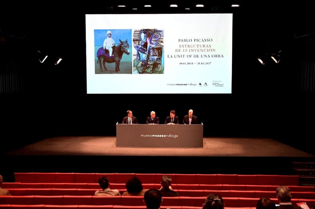 (From L) Miguel Lopez-Remiro, Malaga Picasso Museum’s Artistic Director, Bernard Ruiz-Picasso, grand son of Pablo Picasso, Jose Angel Velez Gonzalez, Delegate for Culture at the Junta de Andalucia’s (Andalusian regional government), and Michael FitzGerald director of the program in art history at Trinity College and curator of the exhibition of ‘Pablo Picasso: structures of invention, the unity of a life’s work’ exhibition speak on stage during the exhibition’s official unveiling at Malaga’s Picasso museum, on March 18, 2024. (Photo by CRISTINA QUICLER / )