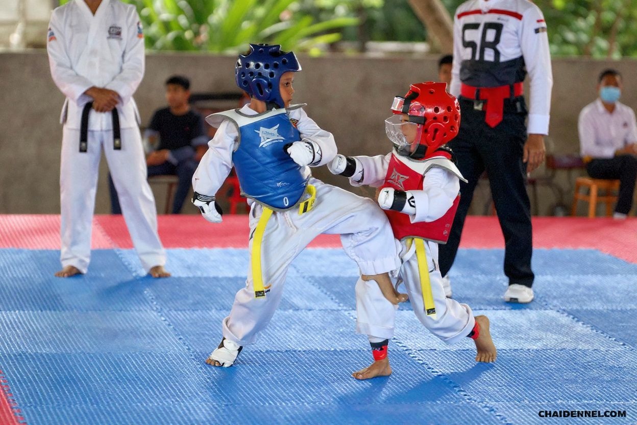 Children compete in a local Taekwondo tournament in Banda Aceh on July 21, 2023. (Photo by CHAIDEER MAHYUDDIN / )