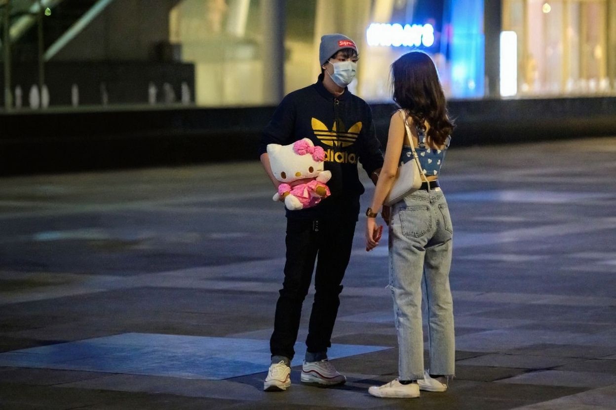 We get that it’s a gift from your partner, but maybe consider bringing a smaller one?, shot on Nikon D850, 35mm f/1.8 lens, RAW photograph, unedited, candid moment, natural lighting, photojournalistic style | NEGATIVE: AI generated, artificial, computer generated, digital art, 3d render