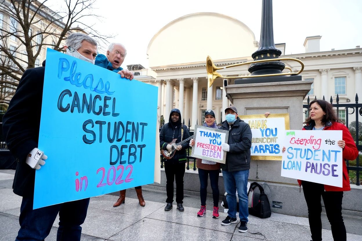 WASHINGTON, DC – JANUARY 13: Student loan borrowers and the Too Much Talent Band thank President Joe Biden and Vice President Kamala Harris for extending the student loan pause and now demand that they cancel student debt at a gathering outside The White House on January 13, 2022 in Washington, DC. Paul Morigi/Getty Images for We, The 45 Million/ (Photo by Paul Morigi / GETTY IMAGES NORTH AMERICA / Getty Images via )