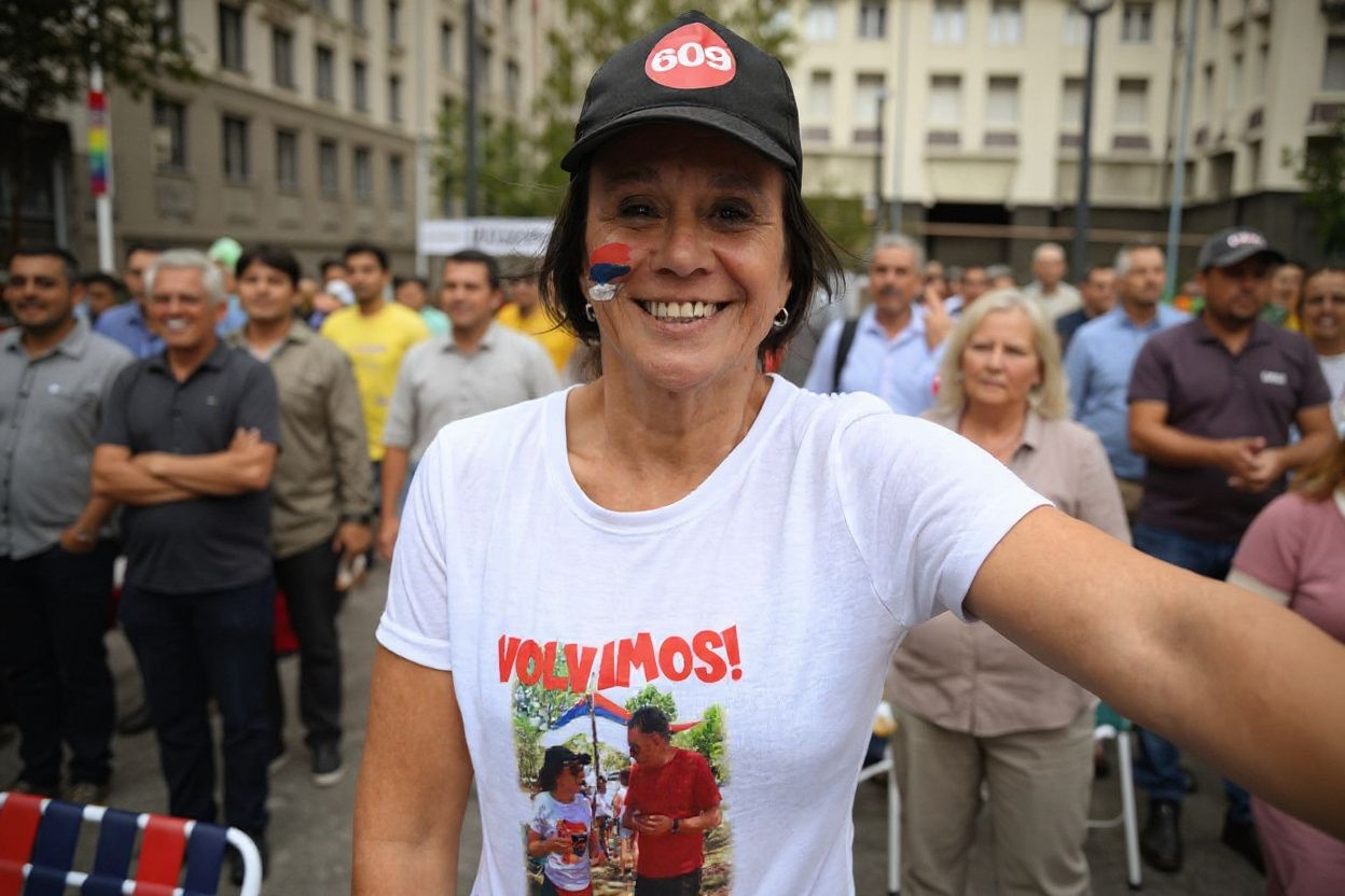 A welcoming smile is always great, but a welcoming government is even better., shot on Sony A7R IV, 85mm f/1.4 lens, RAW photograph, unedited, candid moment, natural lighting, photojournalistic style | NEGATIVE: AI generated, artificial, computer generated, digital art, 3d render