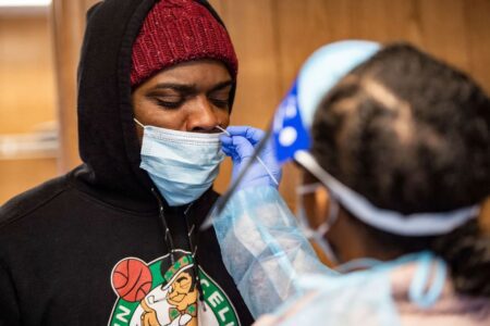 Australia still open to students despite first Omicron death recorded