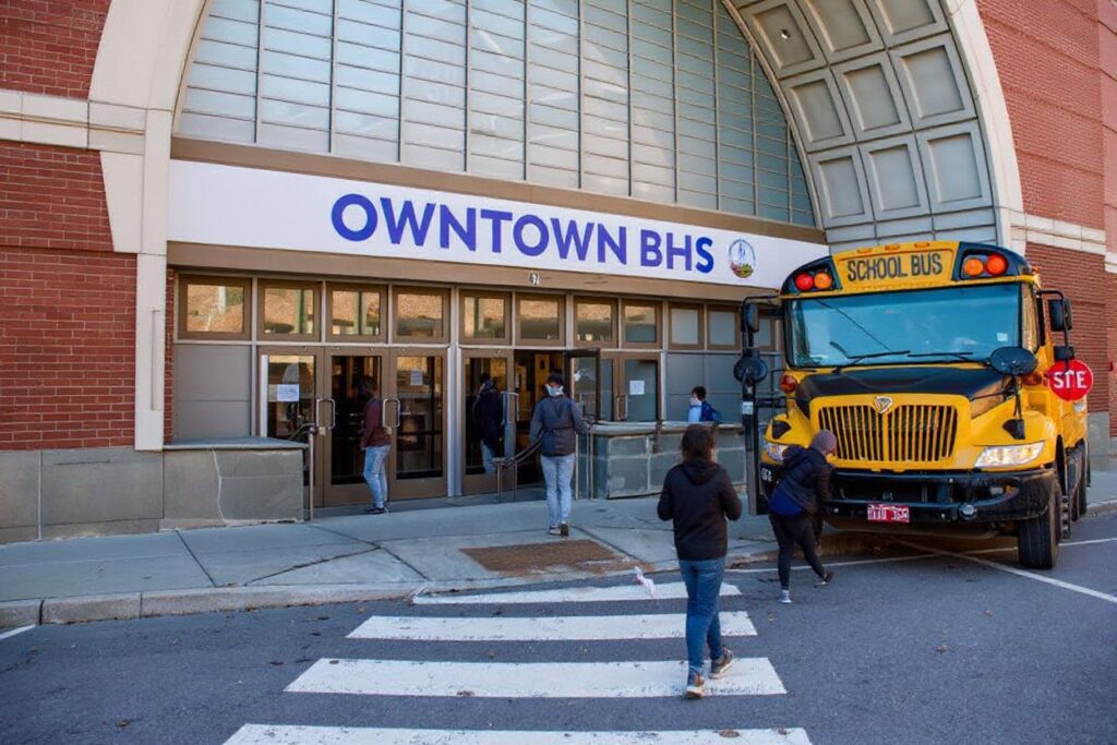 Students enter their new Downtown Burlington High School at a closed Macy’s department store in Burlington, Vermont on March 30, 2021. Source: Joseph Prezioso/